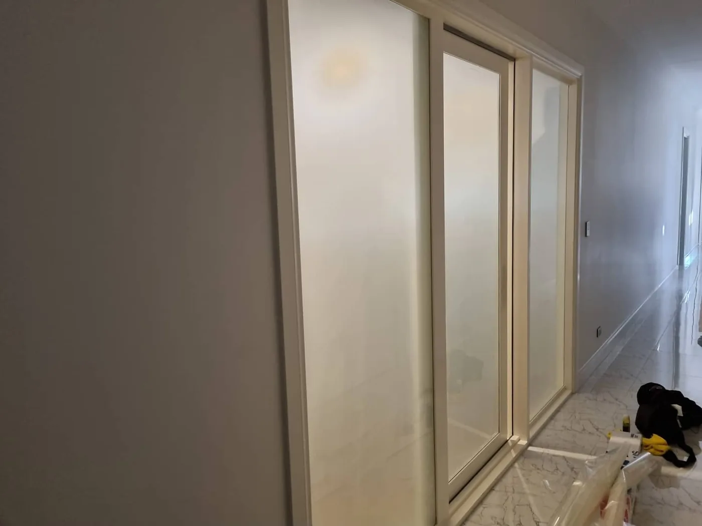 Internal glass doors after frosted window film was fitted for privacy