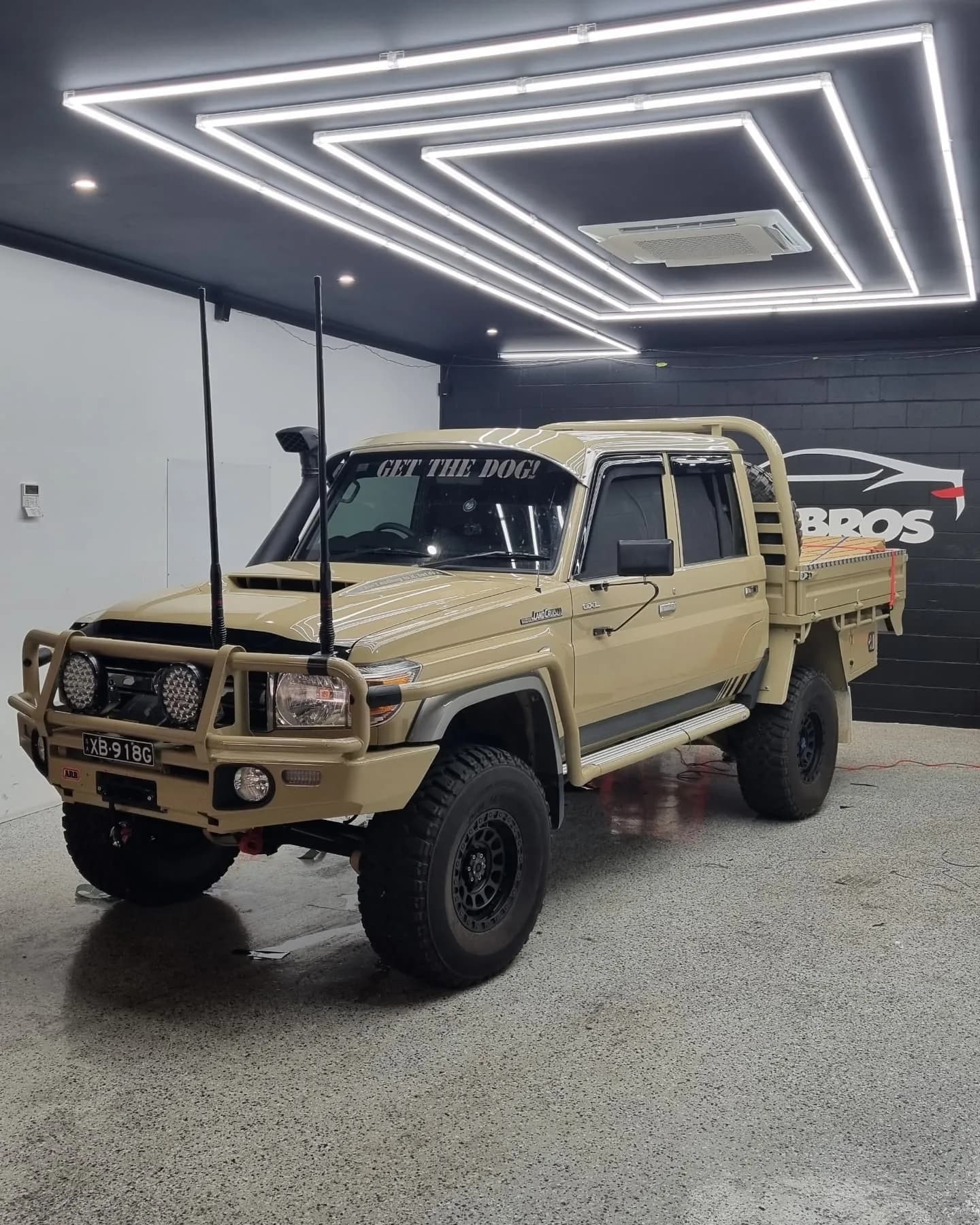 Toyota 79 Series LandCruiser tinted with Rayno S9 Phantom at 20 percent, parked on the Tint Bros bay floor