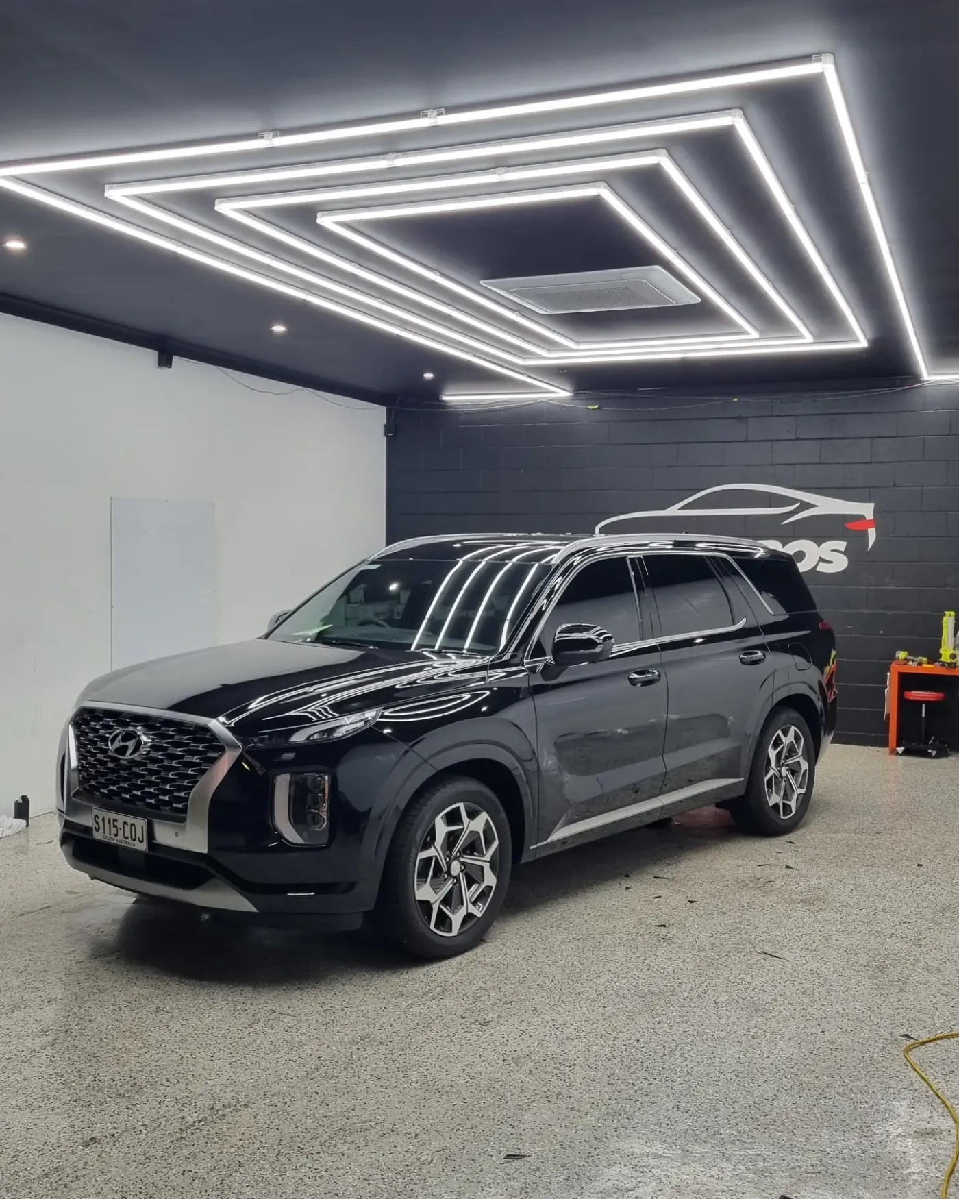 Hyundai Palisade family SUV with a clean ceramic window tint at the Tint Bros studio