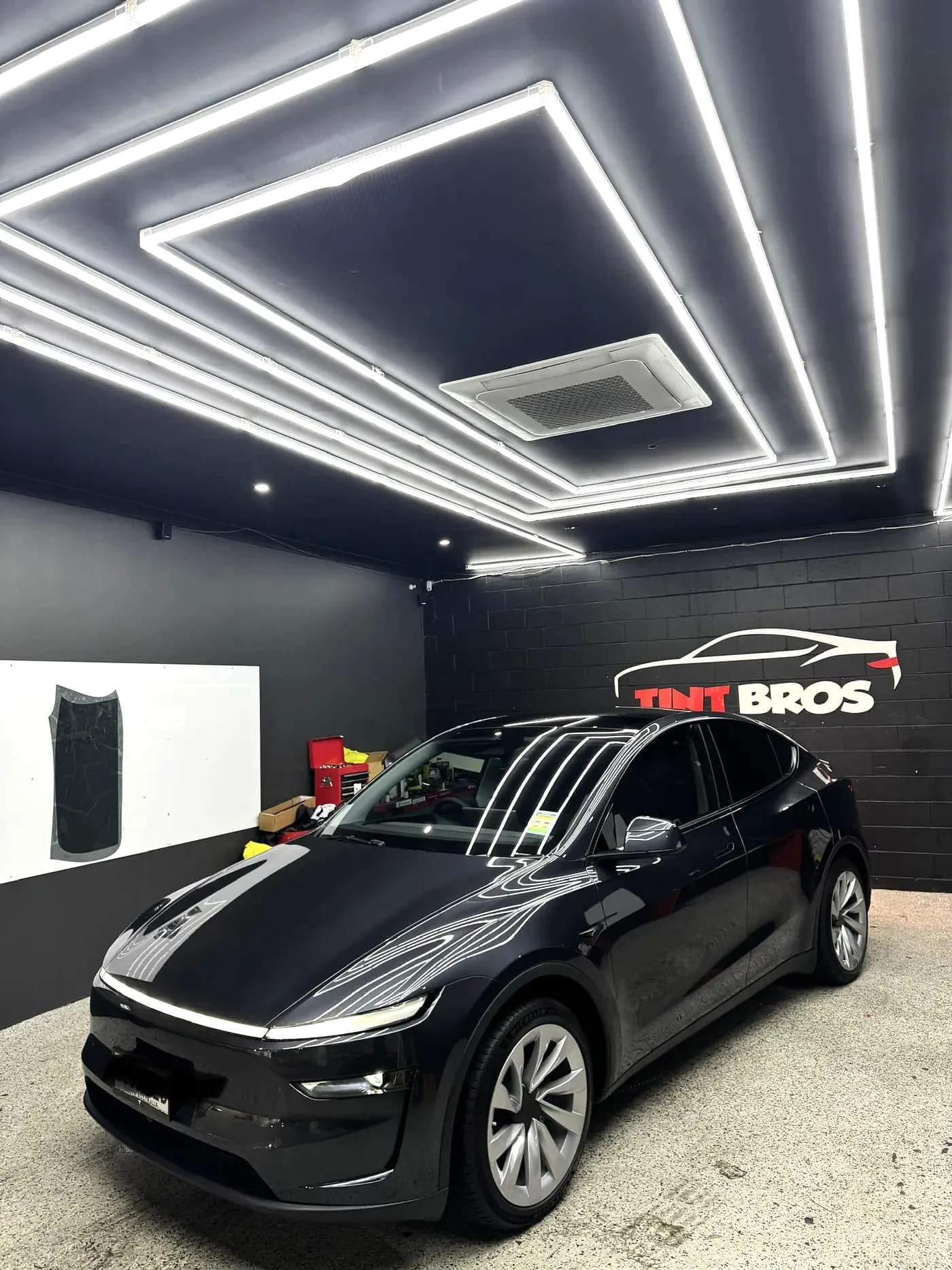 Tesla Model Y with Rayno S9 Phantom tint and Gtechniq ceramic coating by Tint Bros