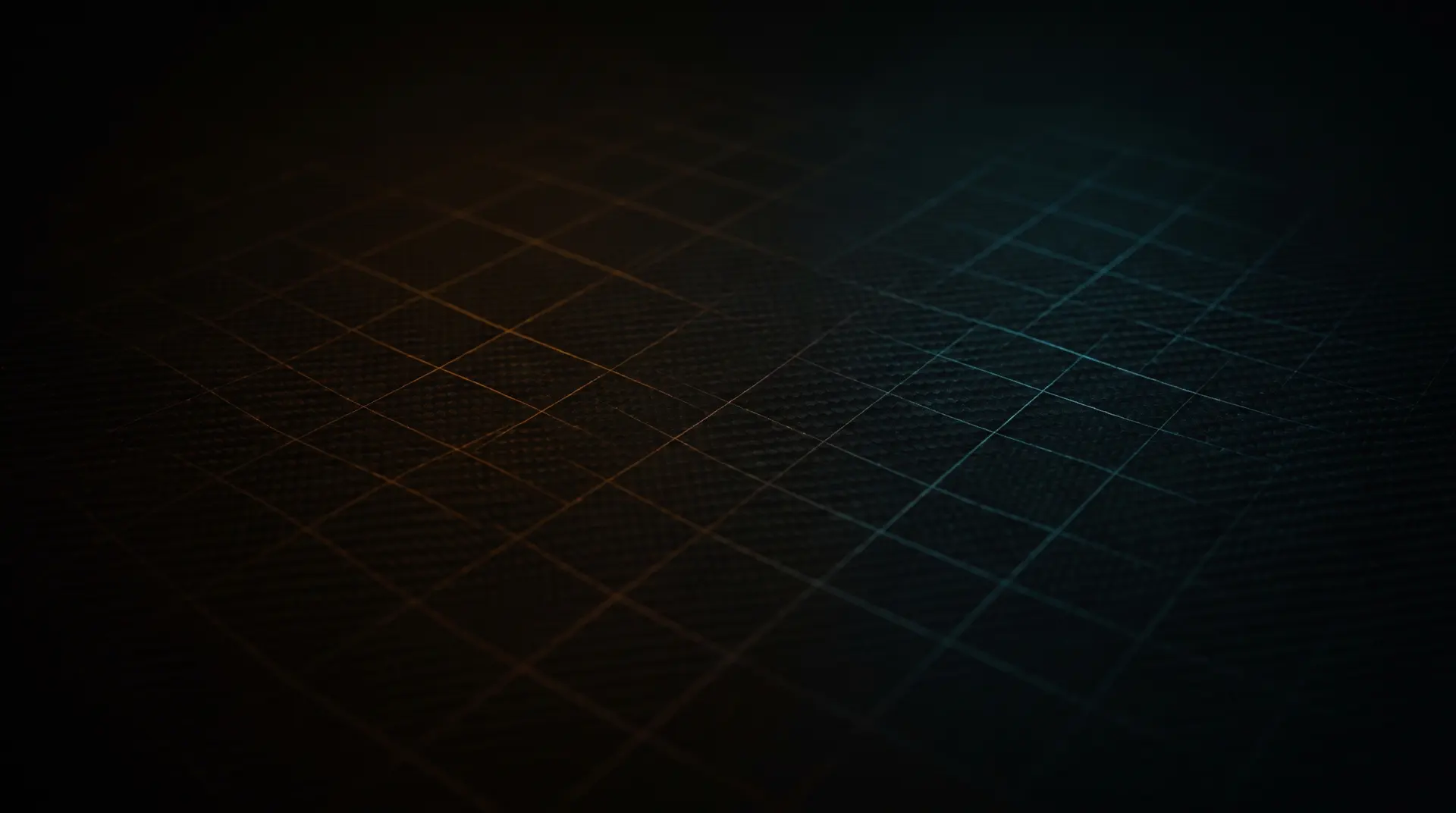 An abstract dark surface with a soft thermal gradient