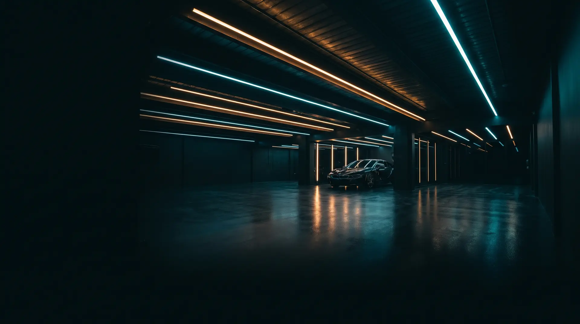 The Tint Bros studio at night with signature LED light lines