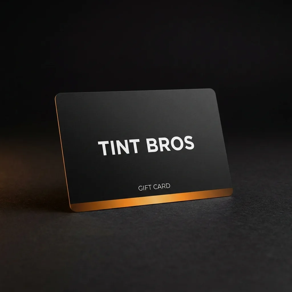 Matte black Tint Bros gift card with ember orange stripe