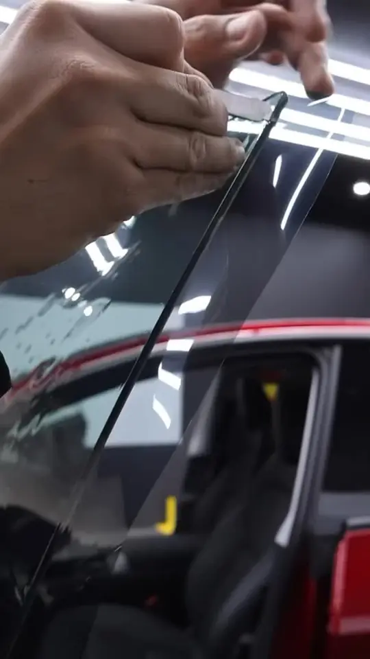 Tesla Model Y having its sides, rear glass and sunroof tinted in Rayno S9 Phantom at Tint Bros Adelaide